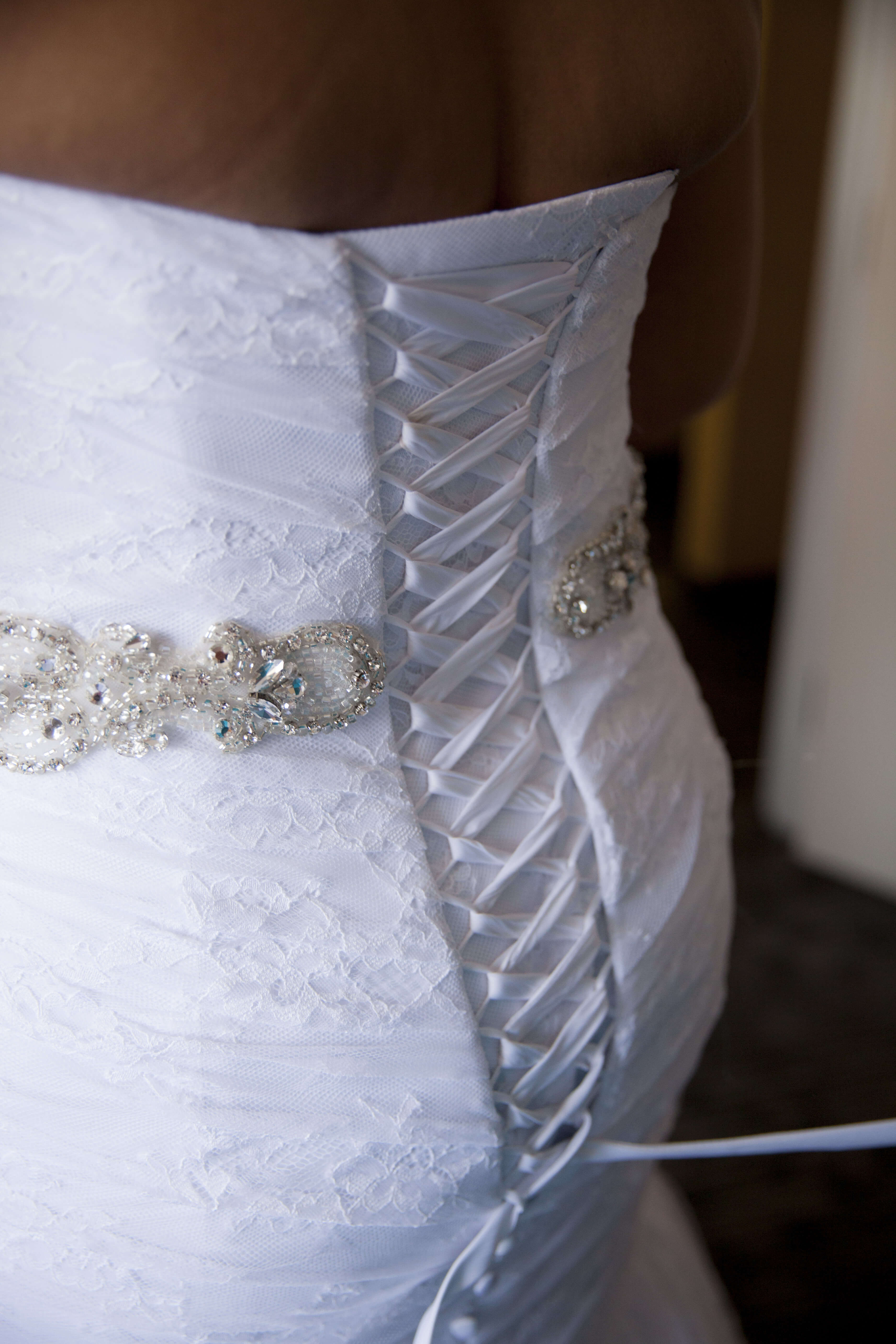 close up of the back of the wedding dress