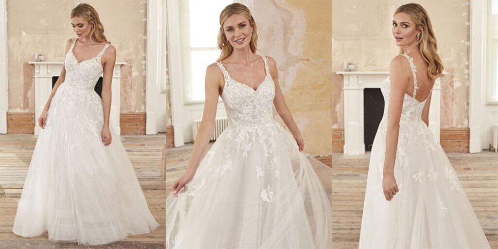 Suyana: delicately layered bodice and sequined tulle underlay wedding dress.