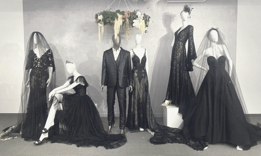 manequins wearing black gowns of different styles