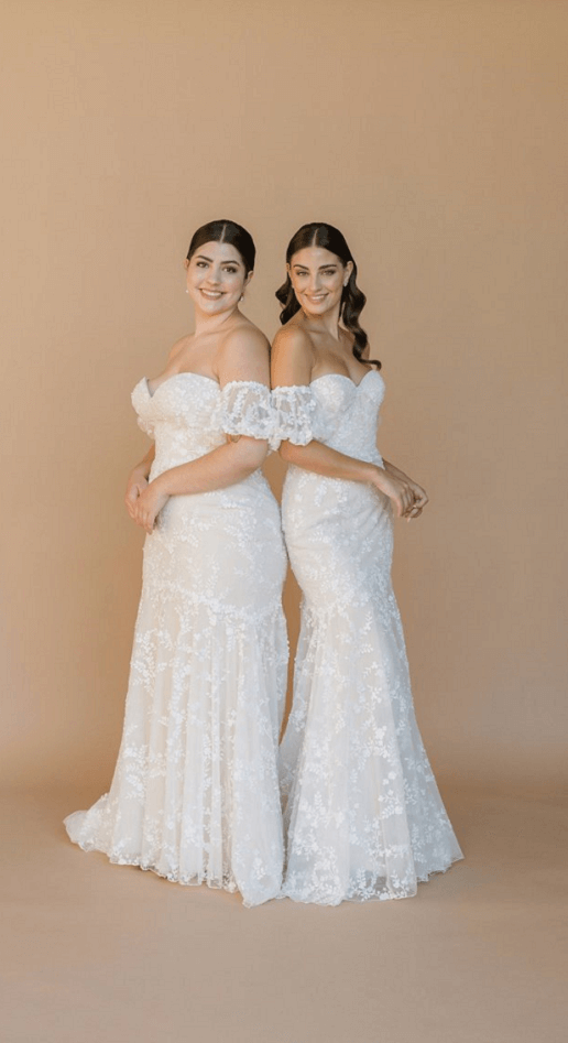 Two brides in the beautiful lace wedding dress, Opal Ann